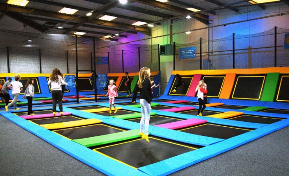 kids playing at trampoline park